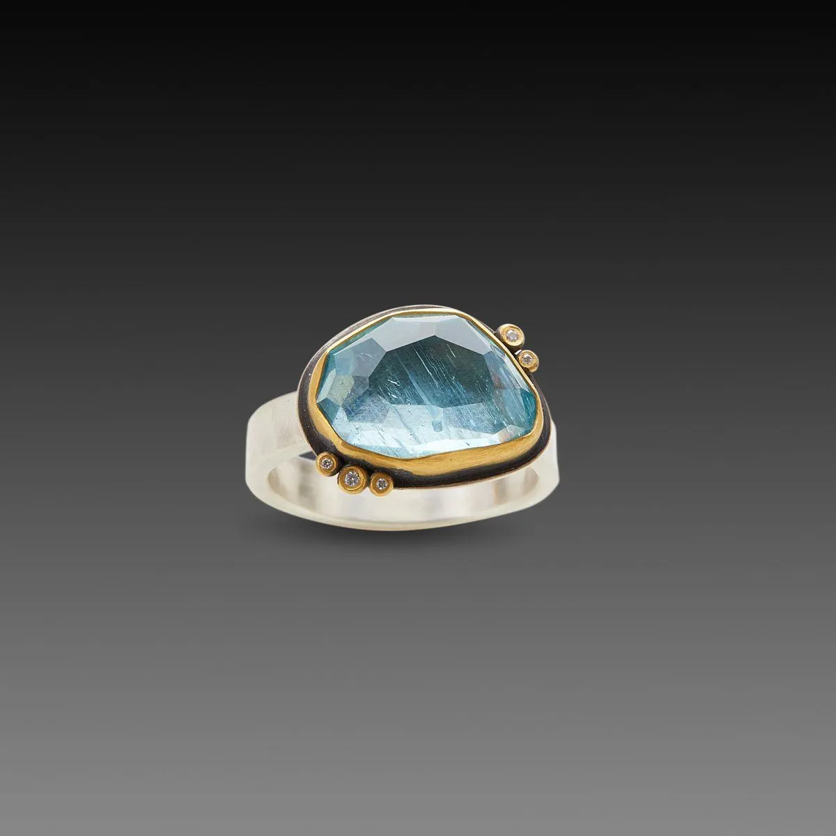 Aquamarine with Five Diamond Dots